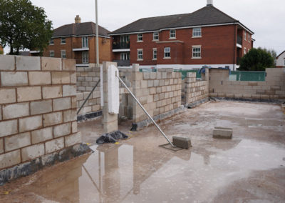 Blockwork construction taking place on a new build