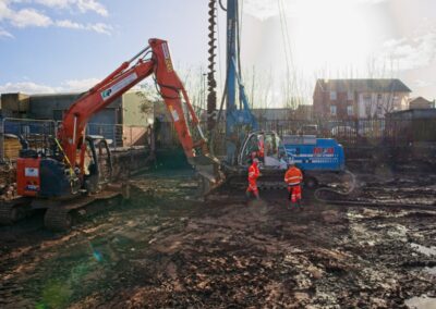  Building contractors install piles