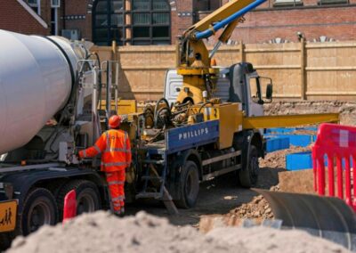 Concrete pumped into construction site