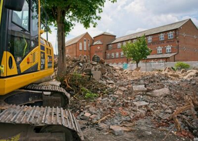 Contractors demolish building site